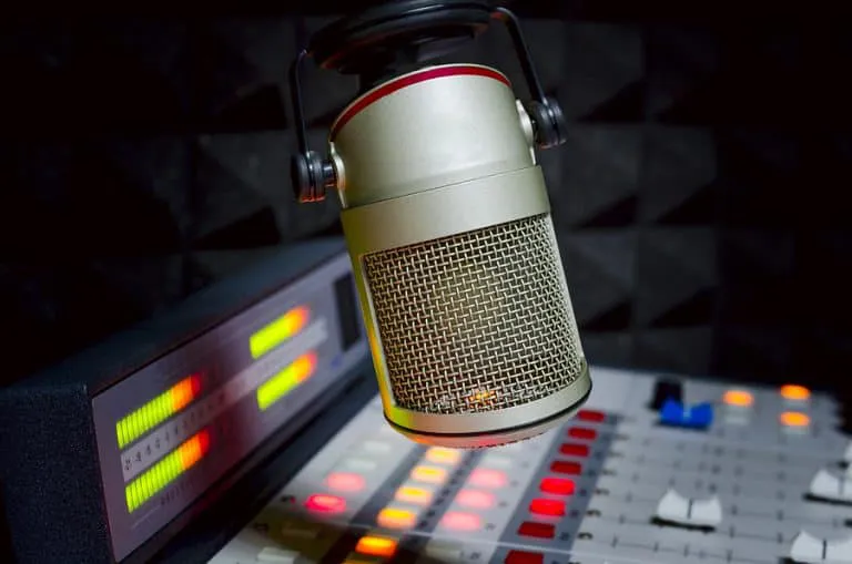 bigstock-microphone-and-audio-console-r-101684732-768x509-1