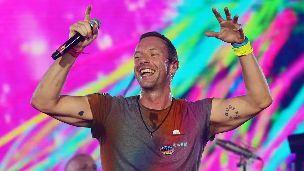 chris-martin-coldplay-gettyimages-1416067993-scaled-e1664971840486