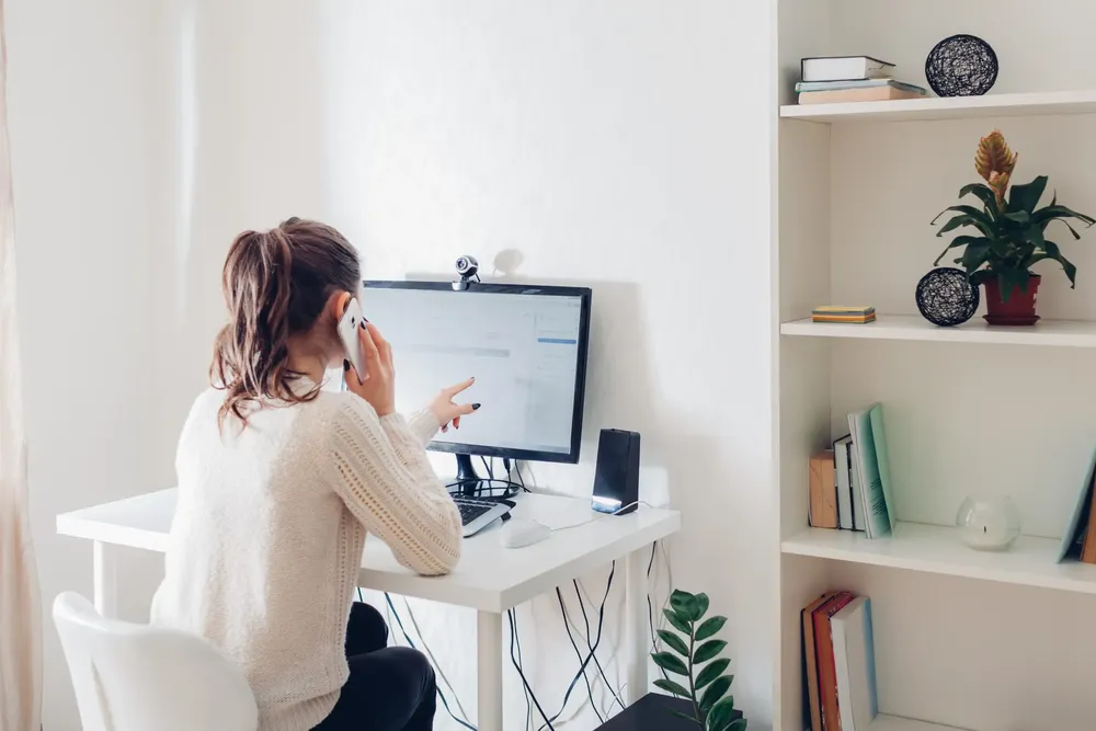 work-from-home-during-coromavirus-pandemic-woman-stays-home-workspace-freelancer-office-interior-with-computer-scaled